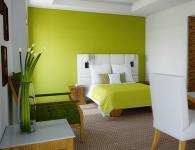 Okrasitev spalnice v zelenih tonih